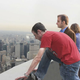 Citizens line up to freely jump off the Empire State Building.